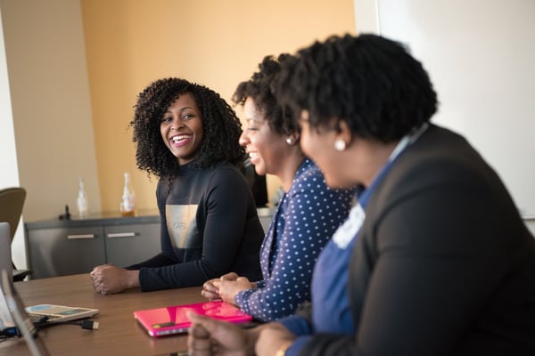 Professionals sitting in a meeting